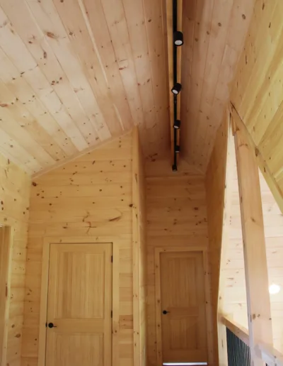 A wooden ceiling in a cabin.
